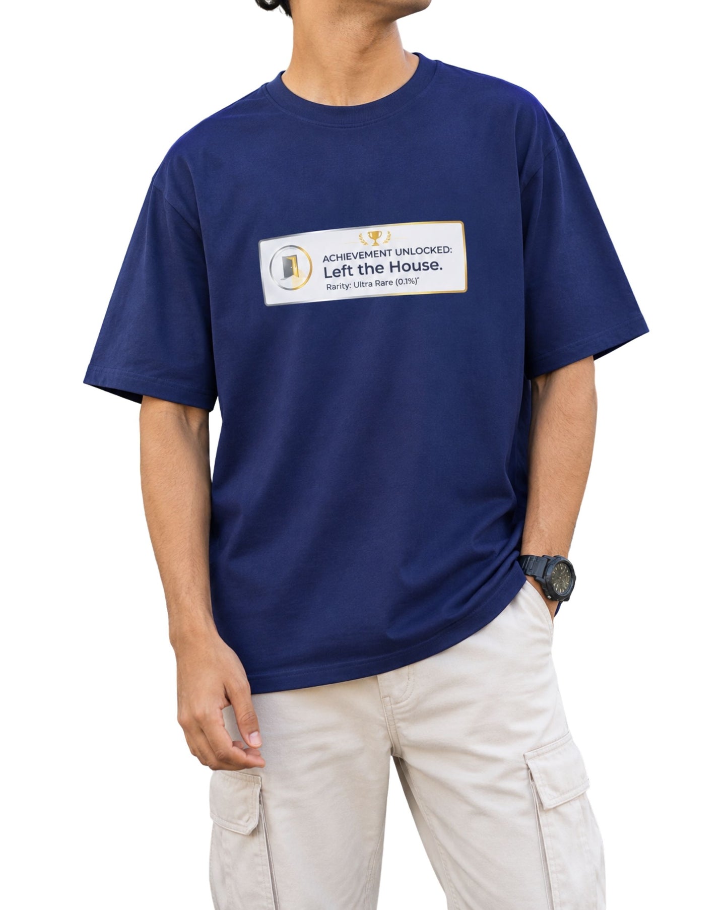 Oversized T-shirt with a gaming-inspired “Achievement Unlocked: Left the House” graphic, trophy icon, doorway symbol, and “Rarity: Ultra Rare (0.1%)” text Royal Blue