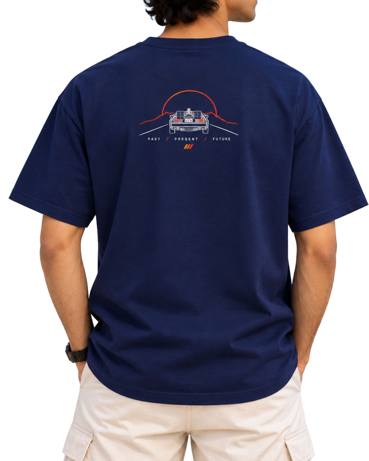 unisex retro T-shirt with rear view of a futuristic time machine car, sunset line art and Past Present Future typography royal blue