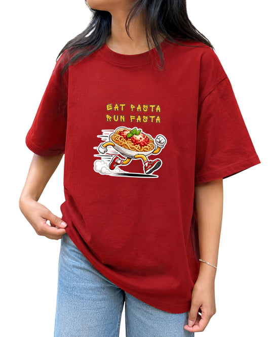 Red oversized T-shirt featuring a playful “Eat Pasta Run Fasta” graphic with an illustrated bowl of pasta running in sneakers.