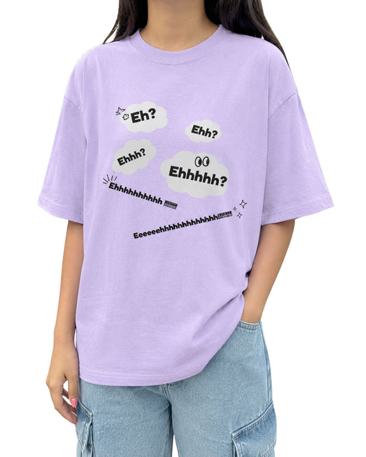 Oversized graphic T-shirt featuring playful “Eh?”, “Ehh?” and “Ehhhh?” expressions in comic-style speech bubbles with quirky doodle accents and bold black typography lavender
