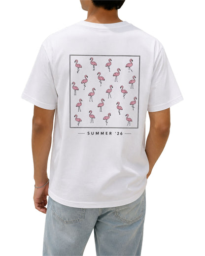 A person wearing a white short-sleeve T-shirt from the back, featuring a large graphic print of pink flamingos inside a thin black square border, with the text 'SUMMER '26' printed below.