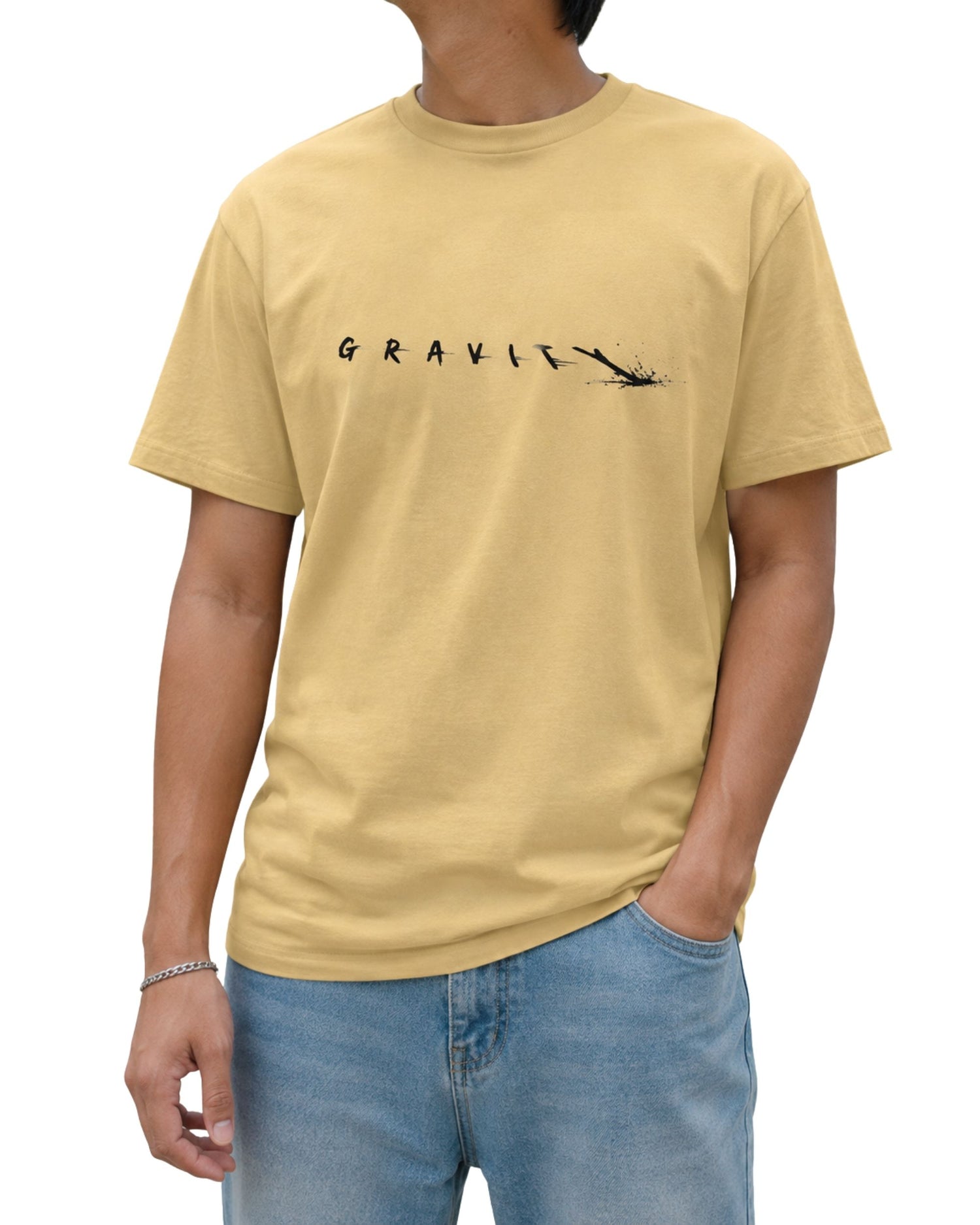 Gravity typography graphic printed on a unisex 100% cotton regular fit T-shirt by Coreteez beige