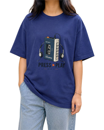 Unisex oversized T-shirt with retro portable cassette player artwork, Press Play music graphic on the front and vintage music player graphic on the back royal blue