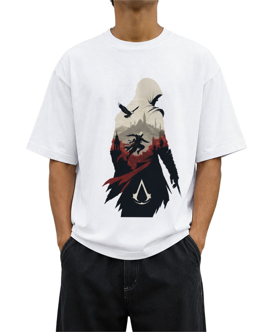 A model wearing a white oversized graphic T-shirt with a hooded assassin-inspired gaming design  photographed outdoors.