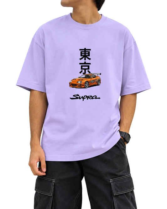 oversized graphic T-shirt with bold Japanese Tokyo typography, an JDM-inspired sports car illustration, and brush-style Supra text on the front lavender