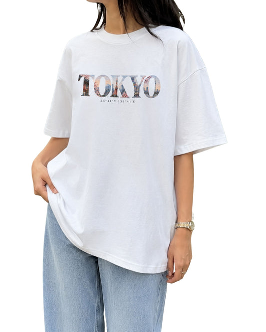 Tokyo travel-inspired graphic oversized T-shirt with artistic city artwork and coordinates, inspired by the dreamy urban mood and vibrant energy of Tokyo, Japan White