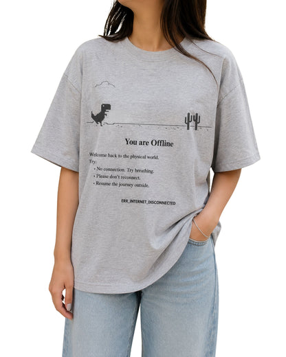 Grey melange oversized T-shirt with a minimalist offline internet graphic, featuring a pixel dinosaur and cactus illustration, “You are Offline” text, digital detox message, and “ERR_INTERNET_DISCONNECTED” detail.