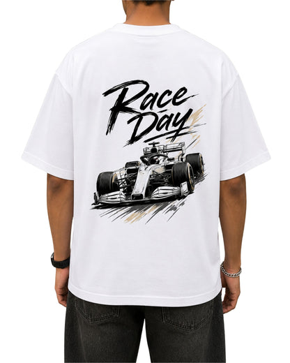 White oversized T-shirt featuring a sketch-style open-wheel racing car graphic with bold “Race Day” brush lettering on the back.