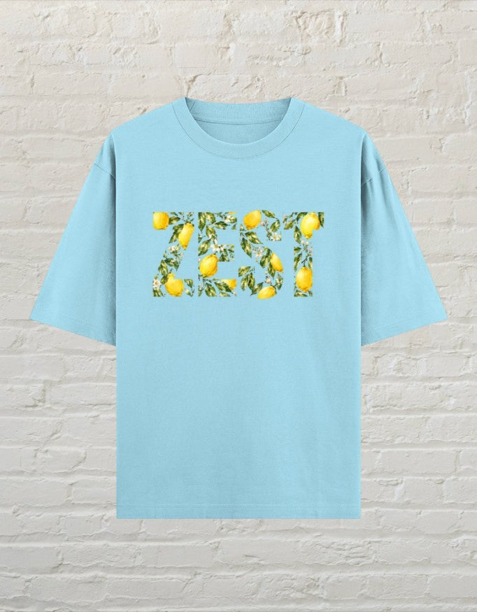 CoreTeez baby blue oversized unisex t-shirt featuring a ZEST graphic with lemon and leaf print