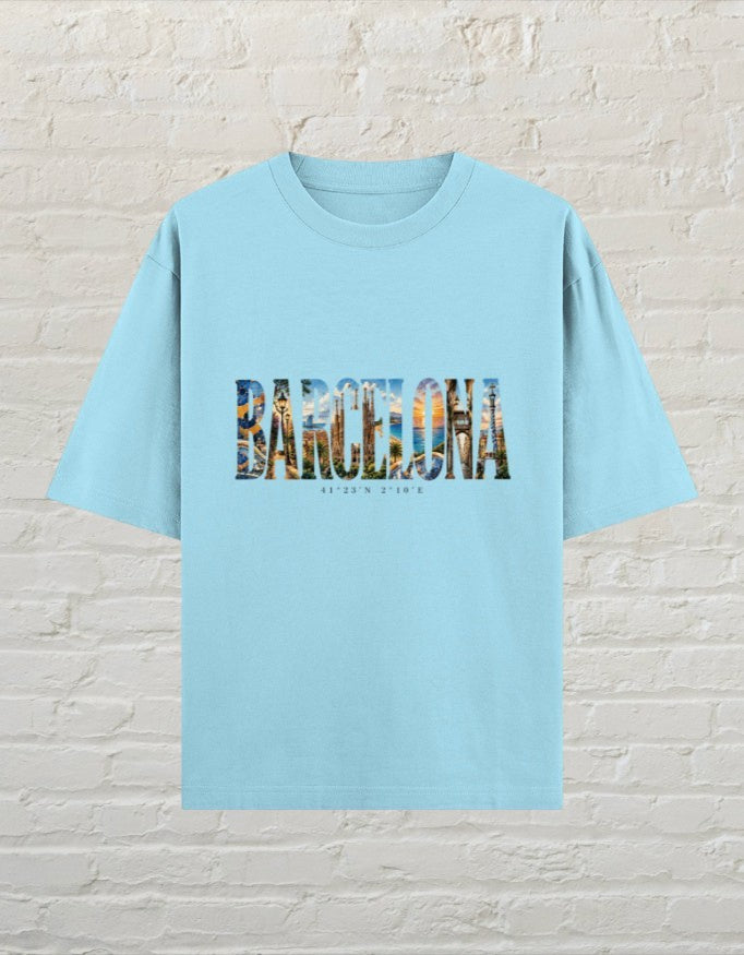CoreTeez baby blue oversized 100% cotton unisex t-shirt featuring a Barcelona city graphic print on the chest