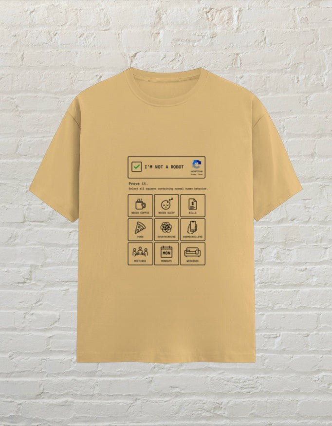 CoreTeez unisex beige cotton t-shirt featuring a funny I'm Not A Robot graphic print on the front.