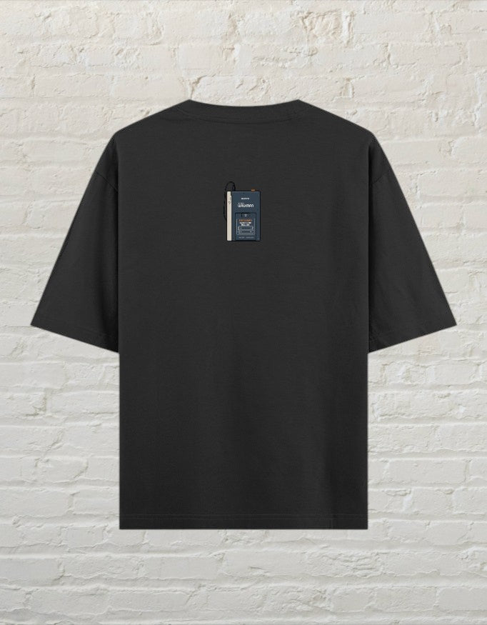 CoreTeez black oversized cotton t-shirt with a small retro cassette player graphic on the back
