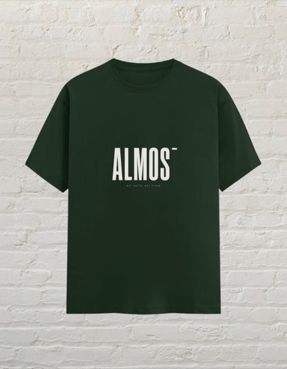 CoreTeez unisex crew neck graphic tee in bottle green cotton with minimalist ALMOST