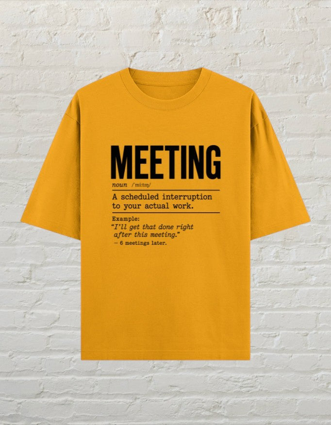 CoreTeez golden yellow oversized cotton t-shirt with a black dictionary-style meeting definition graphic print.