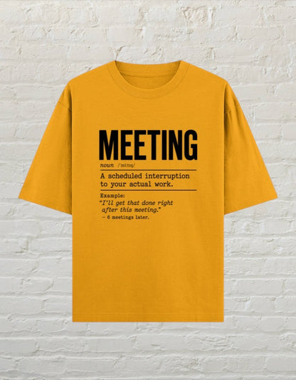 CoreTeez golden yellow oversized cotton t-shirt with a black dictionary-style meeting definition graphic print.