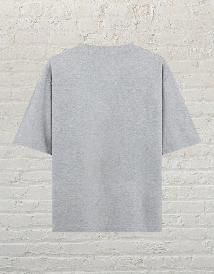 Back view of a CoreTeez grey melange oversized cotton unisex graphic t-shirt.