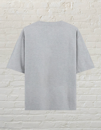 Back view of a CoreTeez grey melange oversized cotton unisex graphic t-shirt.