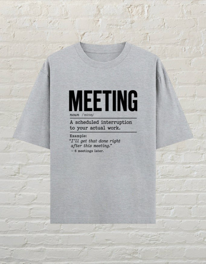 CoreTeez grey melange oversized cotton unisex t-shirt featuring a humorous dictionary-style meeting definition graphic