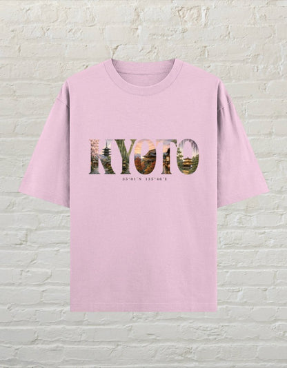 CoreTeez light baby pink oversized cotton unisex t-shirt featuring a Kyoto graphic print with Japanese temple imagery.