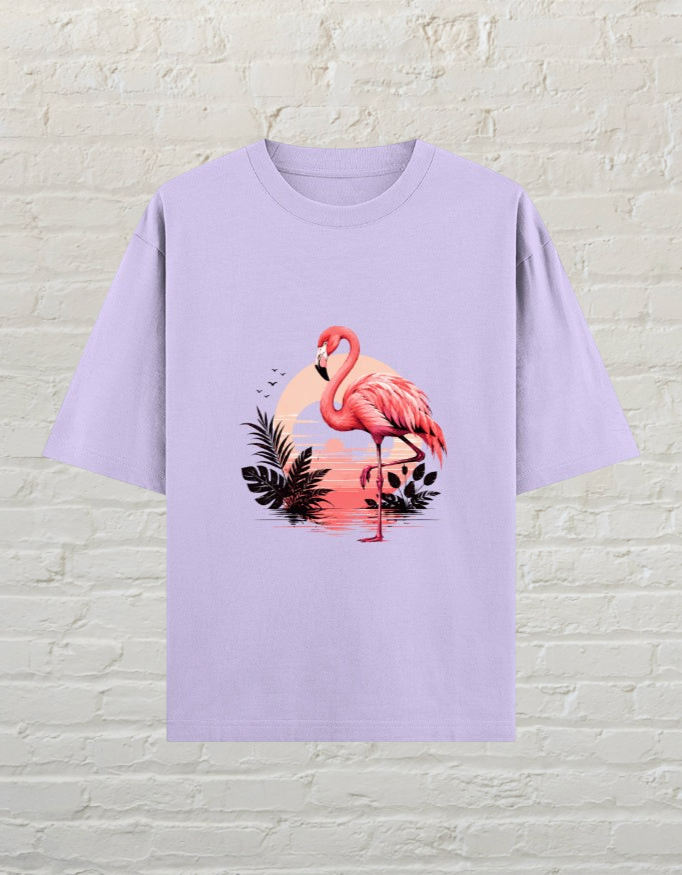 CoreTeez lavender oversized cotton t-shirt featuring a flamingo standing in front of a tropical sunset graphic