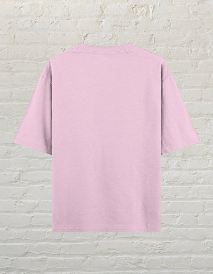 Back view of a CoreTeez light baby pink oversized cotton unisex t-shirt.