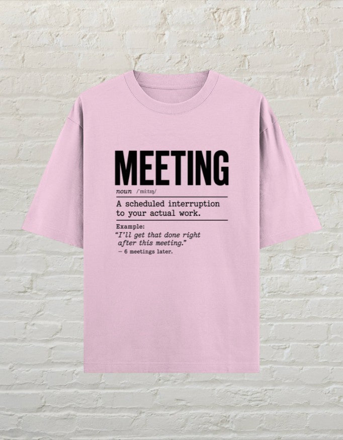 CoreTeez light baby pink oversized cotton t-shirt with a black dictionary-style graphic about office meetings