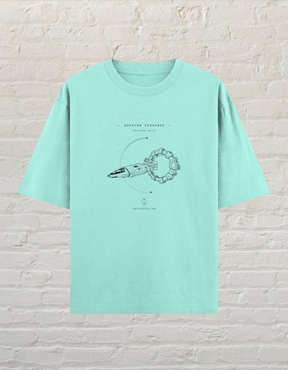 CoreTeez mint oversized cotton t-shirt featuring a Interstellar docking sequence graphic print