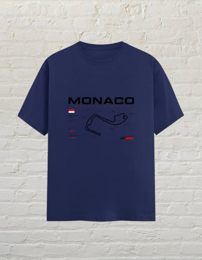 CoreTeez royal blue 100% cotton unisex t-shirt featuring a Monaco circuit racing graphic on the chest.