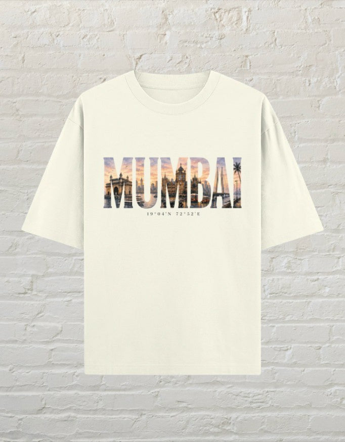 Mumbai travel graphic unisex oversized T-shirt with artistic city typography and sunset-inspired artwork Off White