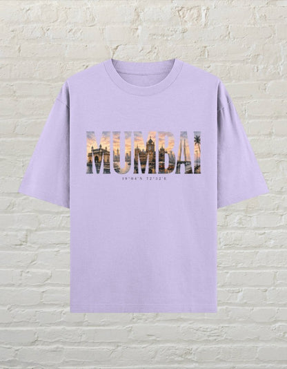 Mumbai travel graphic unisex oversized T-shirt with artistic city typography and sunset-inspired artwork Lavender