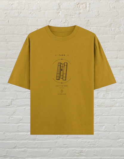 CoreTeez mustard yellow unisex oversized cotton t-shirt featuring a black sci-fi graphic print on the chest