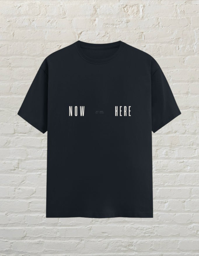 CoreTeez navy blue unisex cotton t-shirt with minimalist white NOW HERE graphic print.