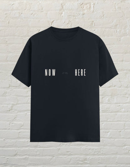 CoreTeez navy blue unisex cotton t-shirt with minimalist white NOW HERE graphic print.