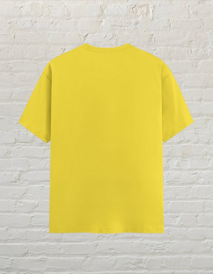 Back view of a plain new yellow CoreTeez unisex cotton t-shirt against.