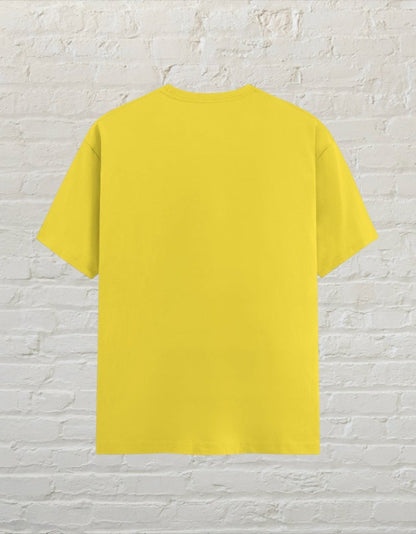 Back view of a plain new yellow CoreTeez unisex cotton t-shirt against.