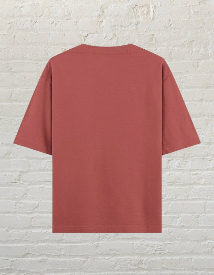 CoreTeez unisex oversized cotton t-shirt in a coral colour, back view 