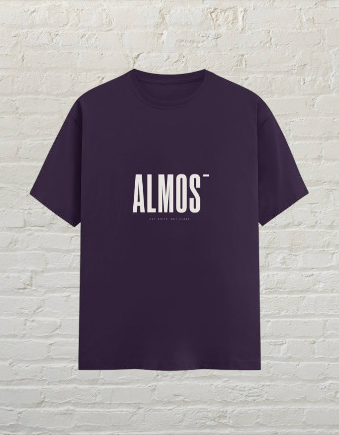 CoreTeez unisex purple 100% cotton crew neck graphic tee with minimalist ALMOST text print