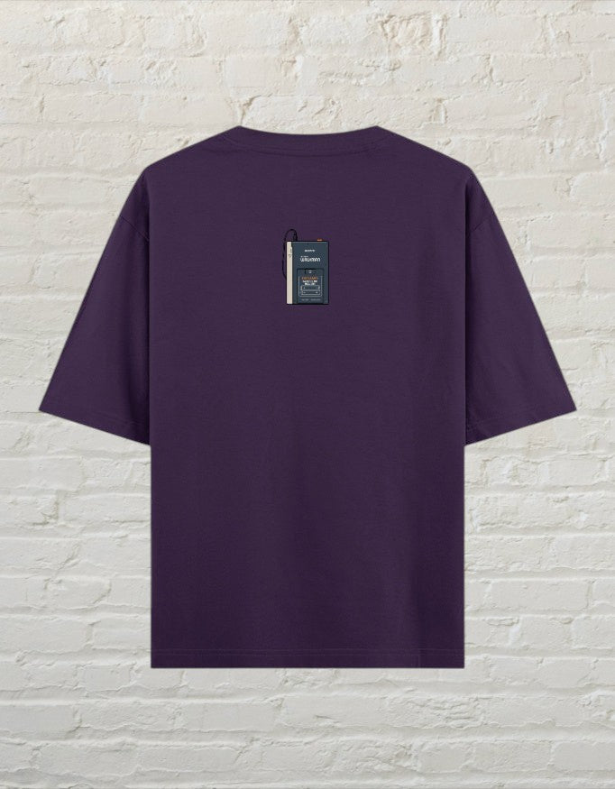 CoreTeez unisex oversized purple cotton t-shirt featuring a retro cassette player graphic on the back