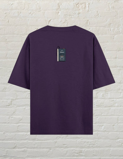 CoreTeez unisex oversized purple cotton t-shirt featuring a retro cassette player graphic on the back