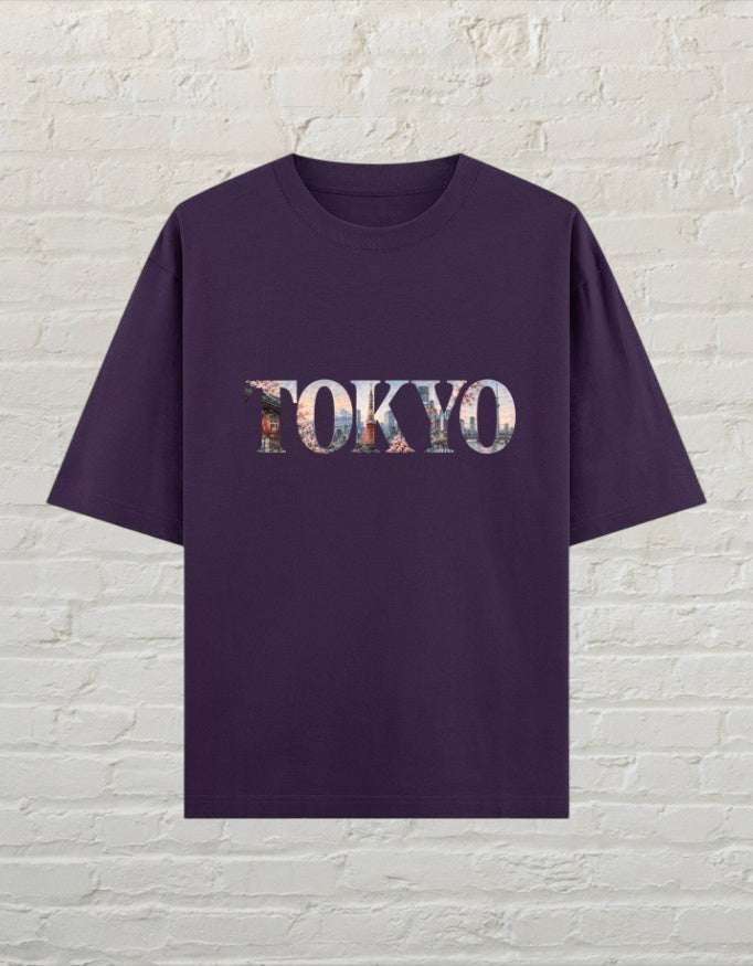 CoreTeez unisex oversized purple cotton t-shirt featuring a Tokyo city graphic print on the chest