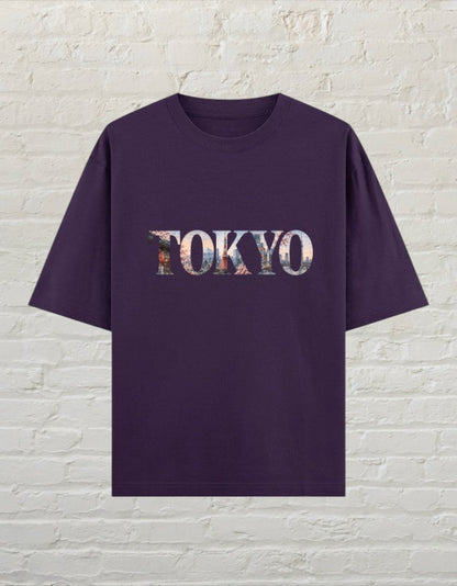 CoreTeez unisex oversized purple cotton t-shirt featuring a Tokyo city graphic print on the chest