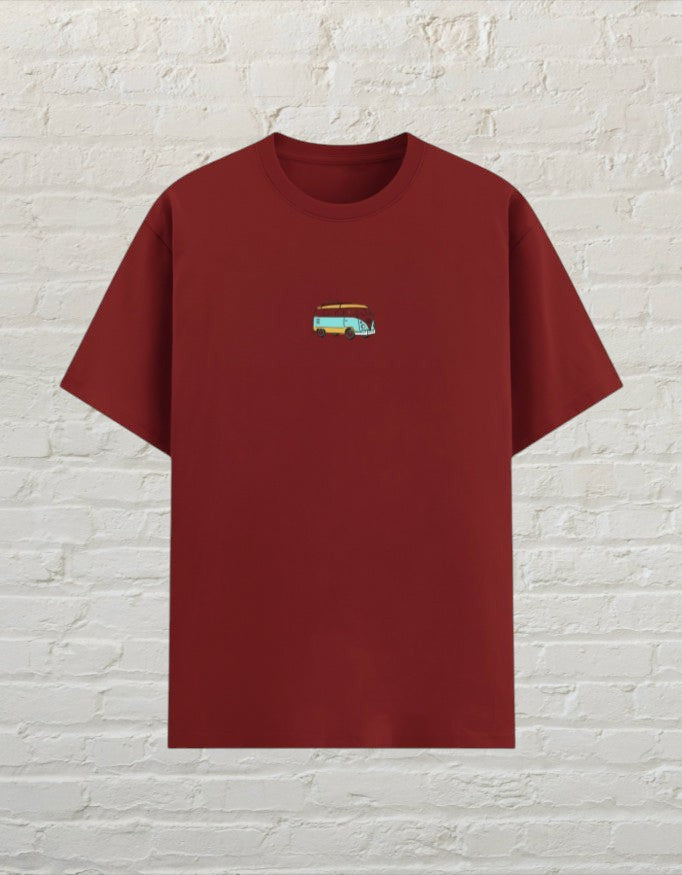 CoreTeez unisex red poly-cotton t-shirt featuring a small retro camper van graphic on the chest