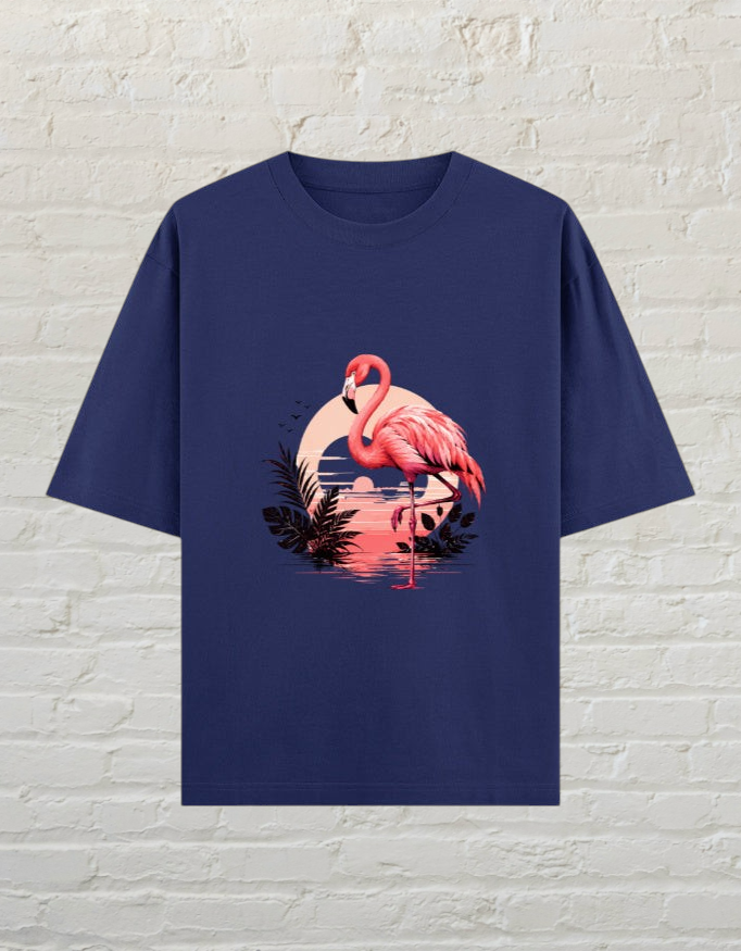 CoreTeez royal blue oversized cotton t-shirt featuring a flamingo graphic against a sunset and palm leaves.