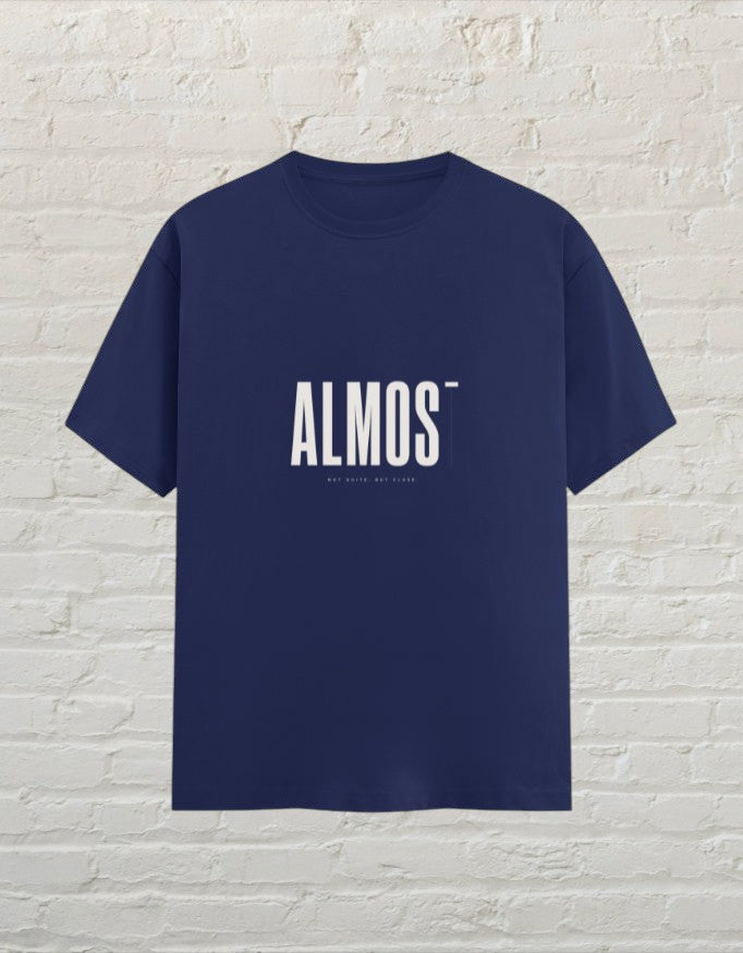 CoreTeez royal blue unisex crew neck graphic tee with minimalist ALMOST text print.