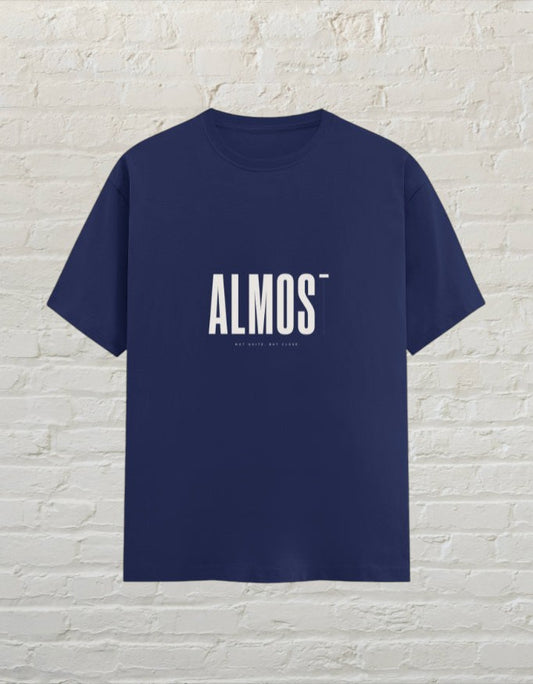 CoreTeez royal blue unisex crew neck graphic tee with minimalist ALMOST text print.