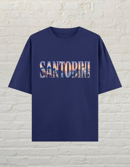 CoreTeez royal blue oversized cotton t-shirt featuring a Santorini travel graphic print on the front