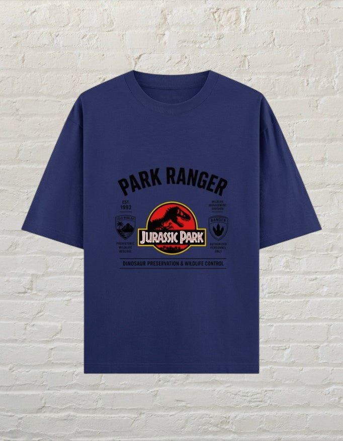 CoreTeez royal blue oversized cotton t-shirt featuring a Jurassic Park Park Ranger graphic print on the chest.