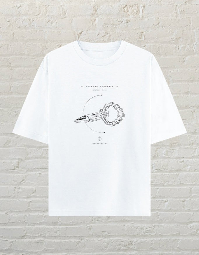 CoreTeez white oversized cotton t-shirt featuring a Interstellar docking sequence graphic print 