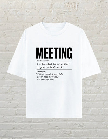 CoreTeez white oversized unisex cotton t-shirt featuring a black dictionary-style graphic about office meetings.