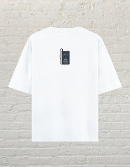 CoreTeez white oversized unisex cotton t-shirt featuring a small retro cassette player graphic on the back